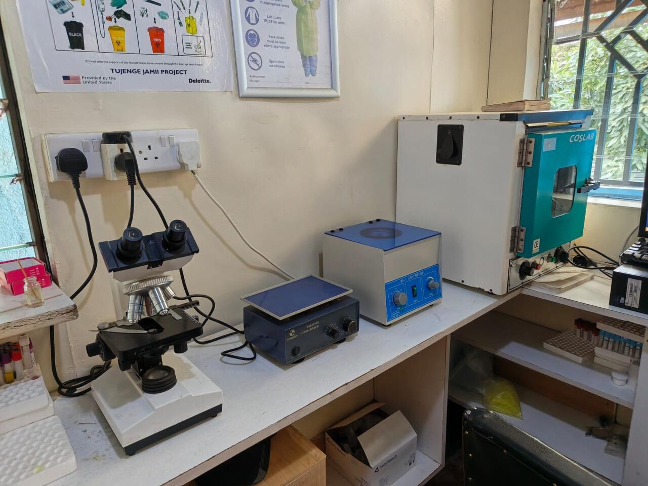 The Primegala laboratory bench, with a microscope, sample shaker, centrifuge and incubator